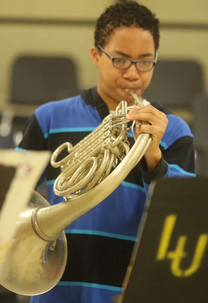 French Hornist at Rehearsal
